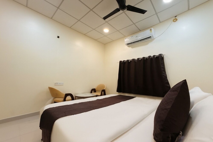 Imagen de la habitación del Hotel Wagheshwari. Foto 13
