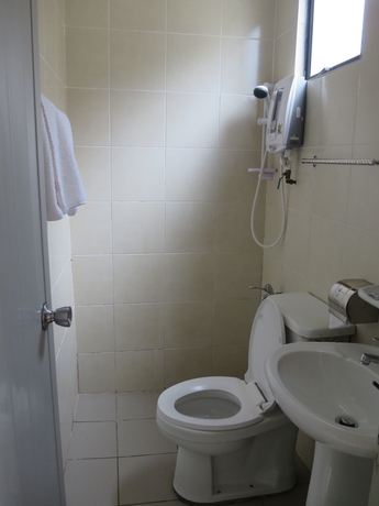 Imagen de la habitación del Hotel Wah May. Foto 4