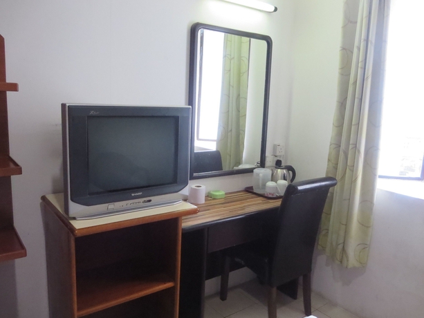 Imagen de la habitación del Hotel Wah May. Foto 5