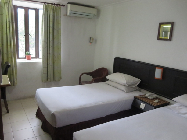 Imagen de la habitación del Hotel Wah May. Foto 6