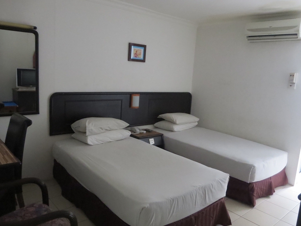 Imagen de la habitación del Hotel Wah May. Foto 9