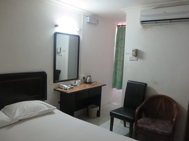 Imagen de la habitación del Hotel Wah May. Foto 11