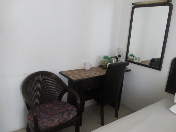 Imagen de la habitación del Hotel Wah May. Foto 13