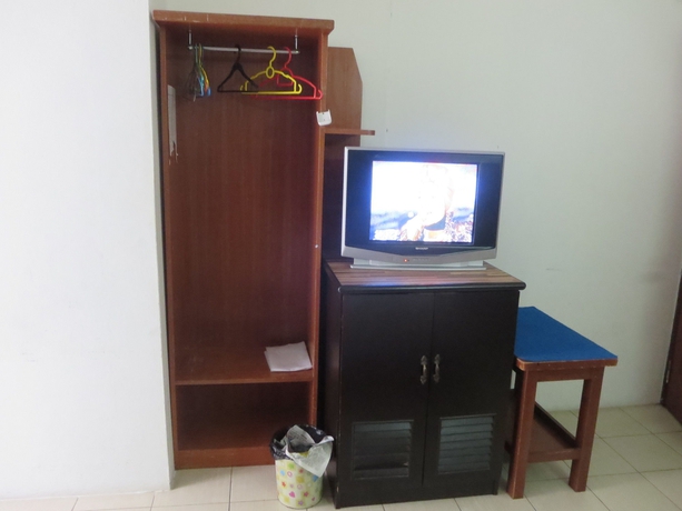 Imagen de la habitación del Hotel Wah May. Foto 14
