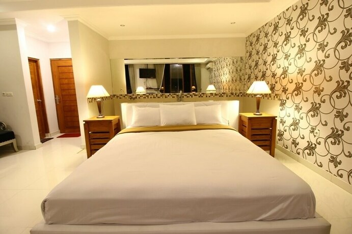 Imagen de la habitación del Hotel Wahyu Dana. Foto 17