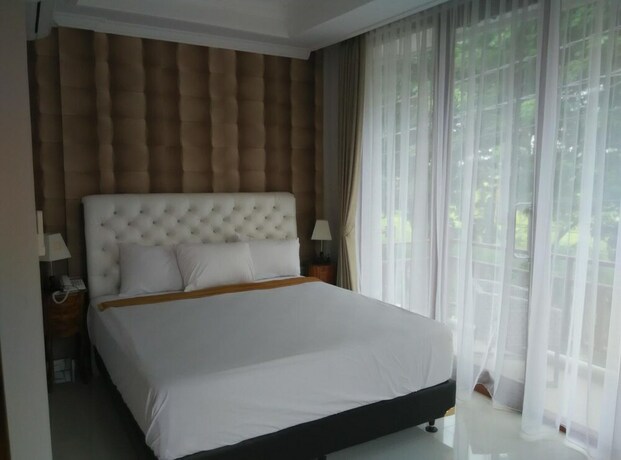 Imagen de la habitación del Hotel Wahyu Dana. Foto 22