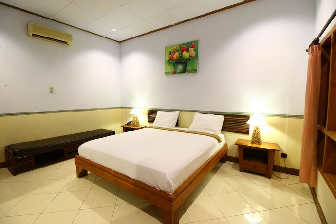 Imagen de la habitación del Hotel Wahyu Dana. Foto 23