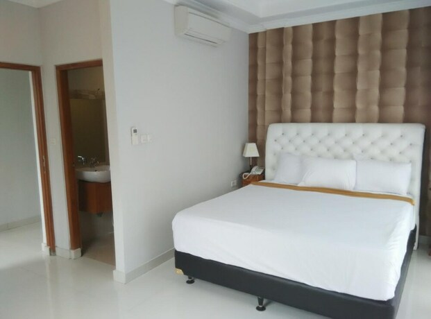 Imagen de la habitación del Hotel Wahyu Dana. Foto 28