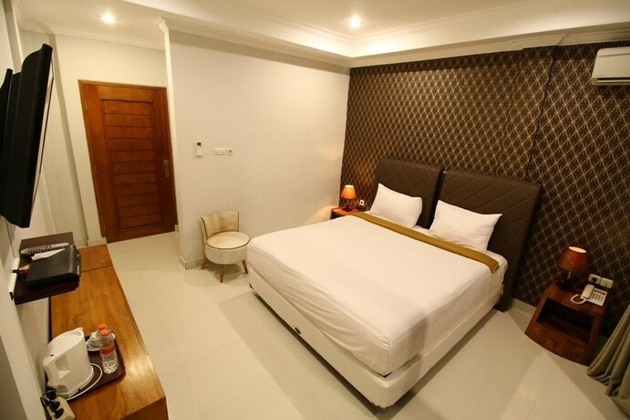 Imagen de la habitación del Hotel Wahyu Dana. Foto 34
