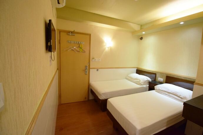 Imagen de la habitación del Hotel Wai Fan Guest House. Foto 10