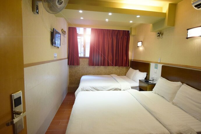Imagen de la habitación del Hotel Wai Fan Guest House. Foto 12