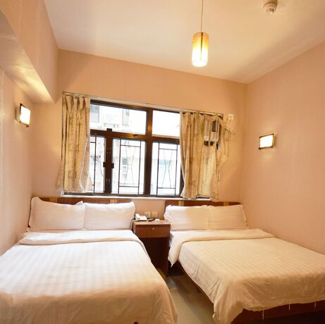 Imagen de la habitación del Hotel Wai Fan Guest House. Foto 15