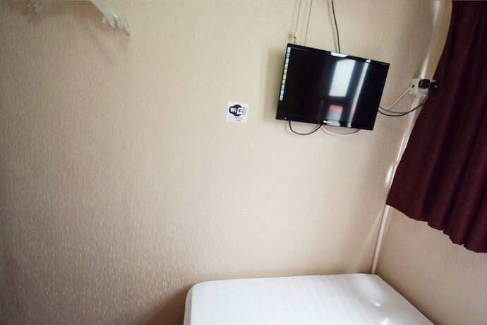 Imagen de la habitación del Hotel Wai Fan Guest House. Foto 16