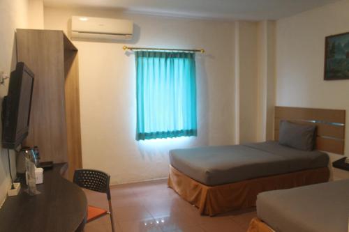 Imagen de la habitación del Hotel Waigo Splash by the icon. Foto 10