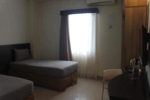 Imagen de la habitación del Hotel Waigo Splash by the icon. Foto 12