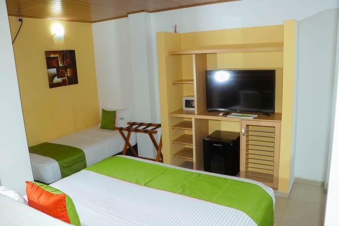 Imagen de la habitación del Hotel Waira Suites. Foto 4