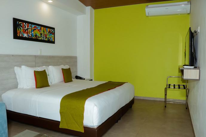 Imagen de la habitación del Hotel Waira Suites. Foto 5