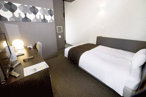 Imagen de la habitación del Hotel Wakayama Urban. Foto 3