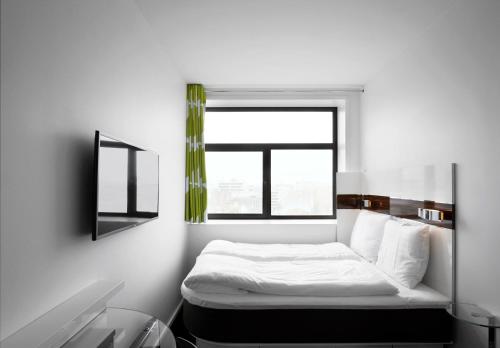 Imagen de la habitación del Hotel Wakeup Copenhagen Bernstorffsgade. Foto 7