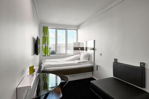 Imagen de la habitación del Hotel Wakeup Copenhagen Bernstorffsgade. Foto 8