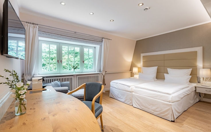 Imagen de la habitación del Hotel Waldhaus Reinbek. Foto 8