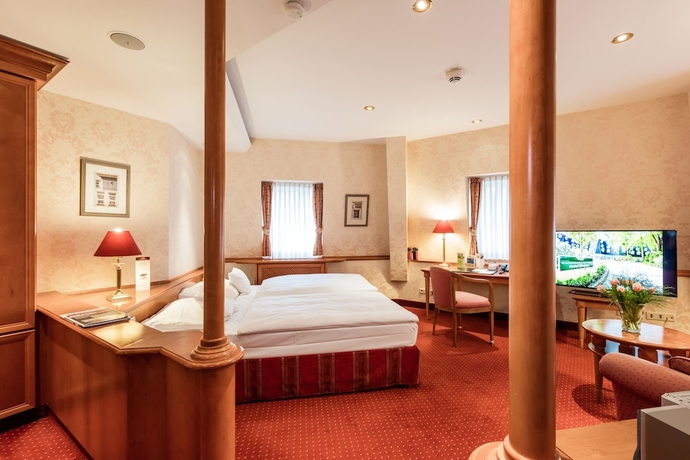 Imagen de la habitación del Hotel Waldhaus Reinbek. Foto 17