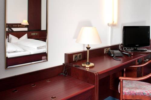 Imagen de la habitación del Hotel Waldhorn, Friedrichshafen. Foto 11