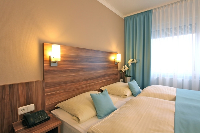 Imagen de la habitación del Hotel Waldhotel Bad Soden. Foto 9