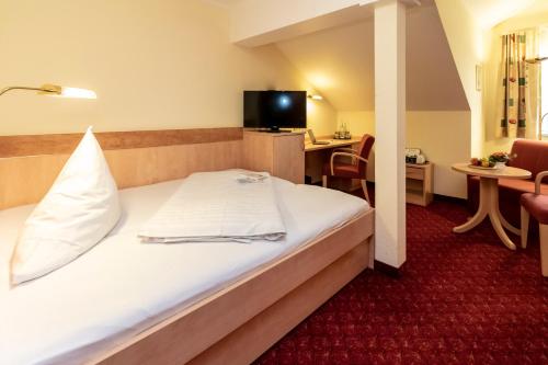 Imagen de la habitación del Hotel Waldhotel Roggosen. Foto 8