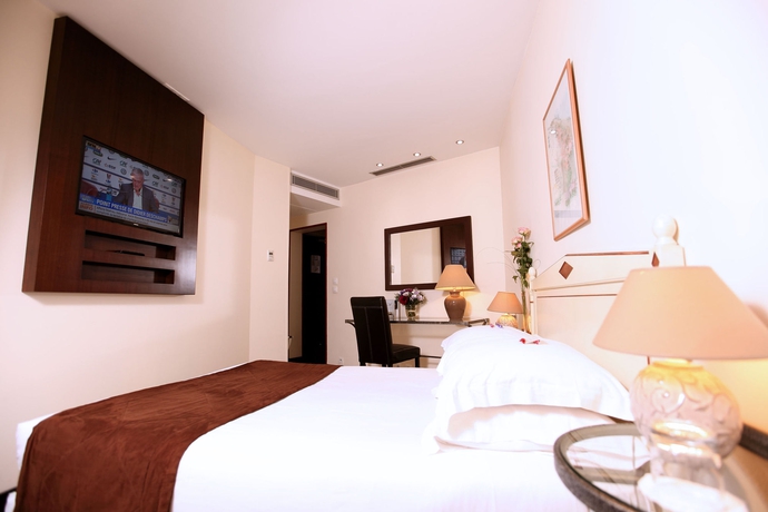 Imagen de la habitación del Hotel Waldorf Montparnasse. Foto 7