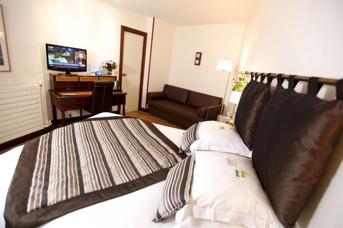 Imagen de la habitación del Hotel Waldorf Montparnasse. Foto 8