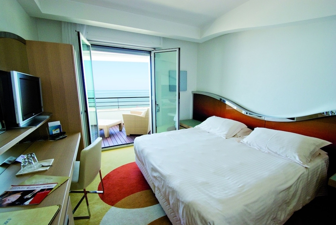 Imagen de la habitación del Hotel Waldorf - Premier Resort. Foto 2