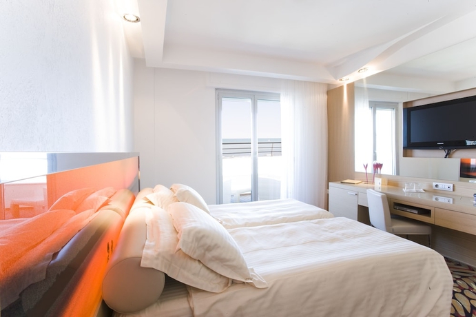 Imagen de la habitación del Hotel Waldorf - Premier Resort. Foto 13