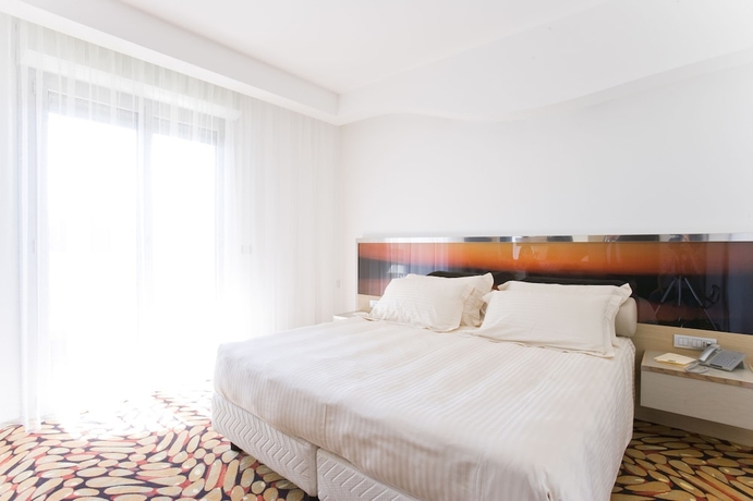 Imagen de la habitación del Hotel Waldorf - Premier Resort. Foto 16