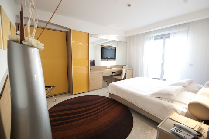 Imagen de la habitación del Hotel Waldorf - Premier Resort. Foto 17