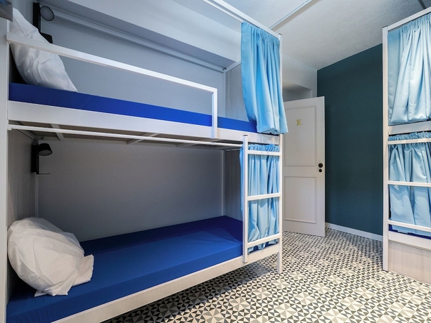 Imagen de la habitación del Hotel Walk in Hostel Faro. Foto 12