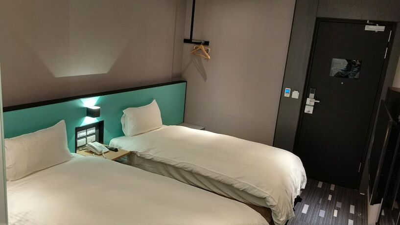 Imagen de la habitación del Hotel Walker-taoyuan. Foto 22