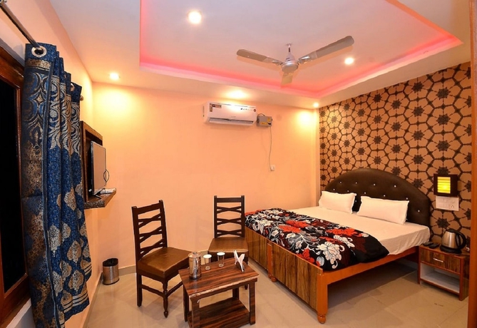 Imagen de la habitación del Hotel Walkin Shiva P Guest House. Foto 6