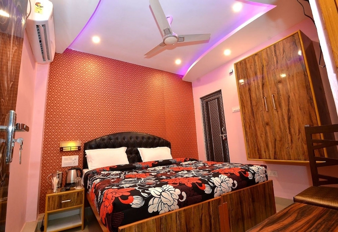 Imagen de la habitación del Hotel Walkin Shiva P Guest House. Foto 7