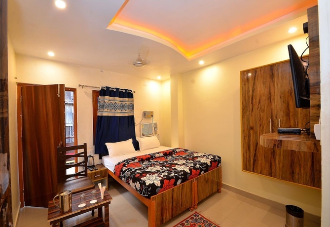 Imagen de la habitación del Hotel Walkin Shiva P Guest House. Foto 9
