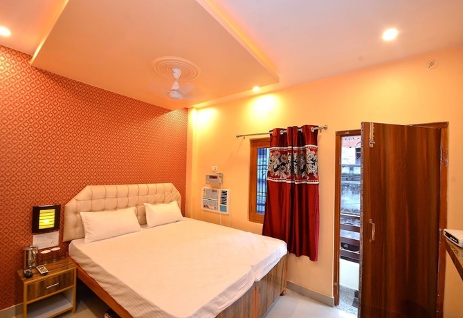 Imagen de la habitación del Hotel Walkin Shiva P Guest House. Foto 10