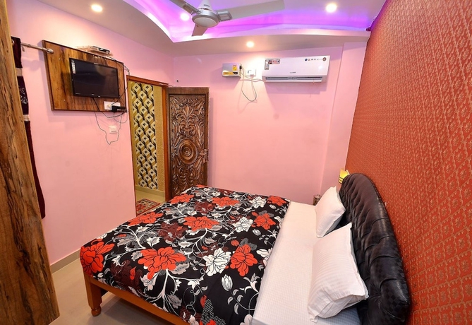 Imagen de la habitación del Hotel Walkin Shiva P Guest House. Foto 11