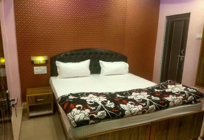 Imagen de la habitación del Hotel Walkin Shiva P Guest House. Foto 12