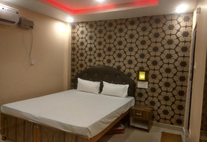 Imagen de la habitación del Hotel Walkin Shiva P Guest House. Foto 13