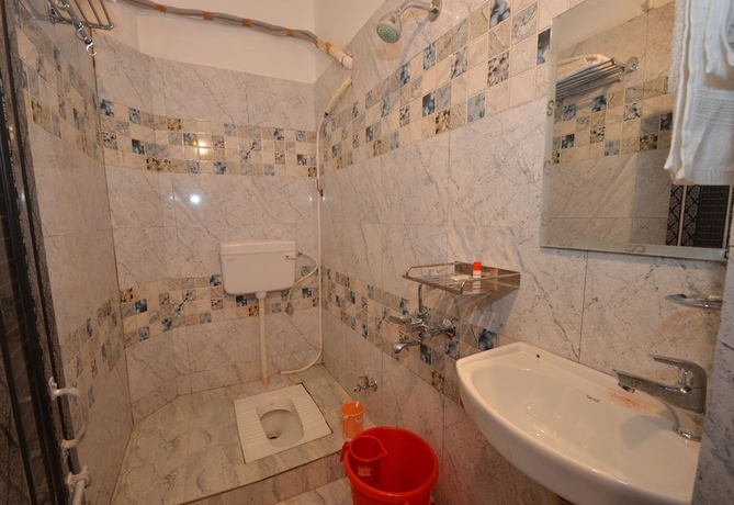 Imagen de la habitación del Hotel Walkin Shiva P Guest House. Foto 14