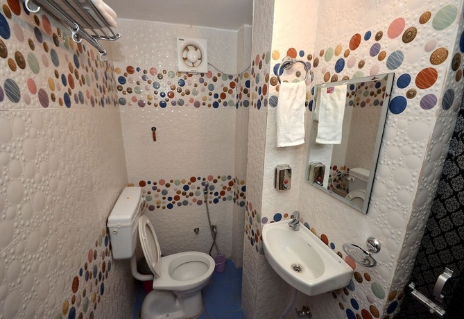 Imagen de la habitación del Hotel Walkin Shiva P Guest House. Foto 15