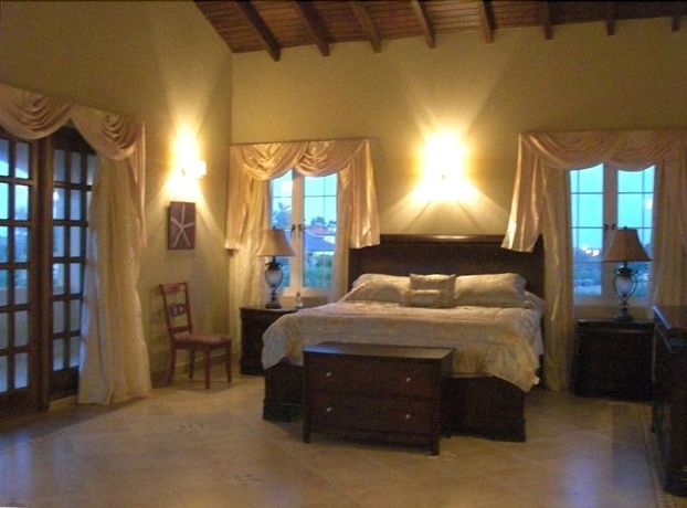 Imagen de la habitación del Hotel Walking To The Beach Villa. Foto 4