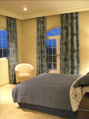 Imagen de la habitación del Hotel Walking To The Beach Villa. Foto 6