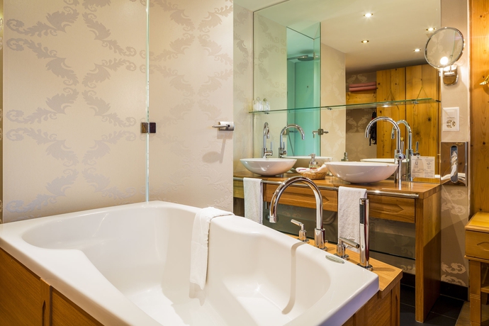 Imagen de la habitación del Hotel Walliserhof Grand and Spa. Foto 2