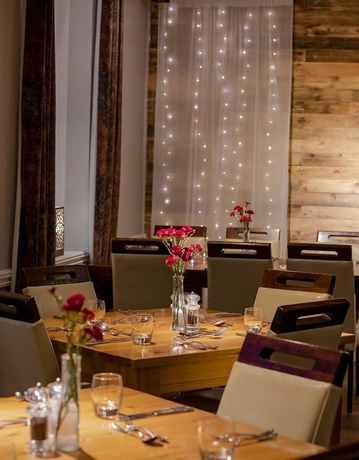 Imagen del bar/restaurante del Hotel Walnut Tree Inn. Foto 4